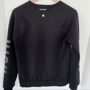 Black Home Stretch crew fleece lined sweatshirt.